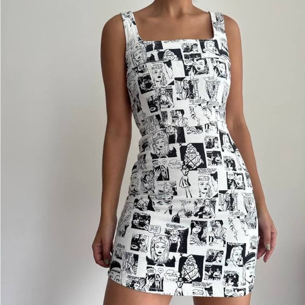Black and White newspaper reformation jean dress! So unique